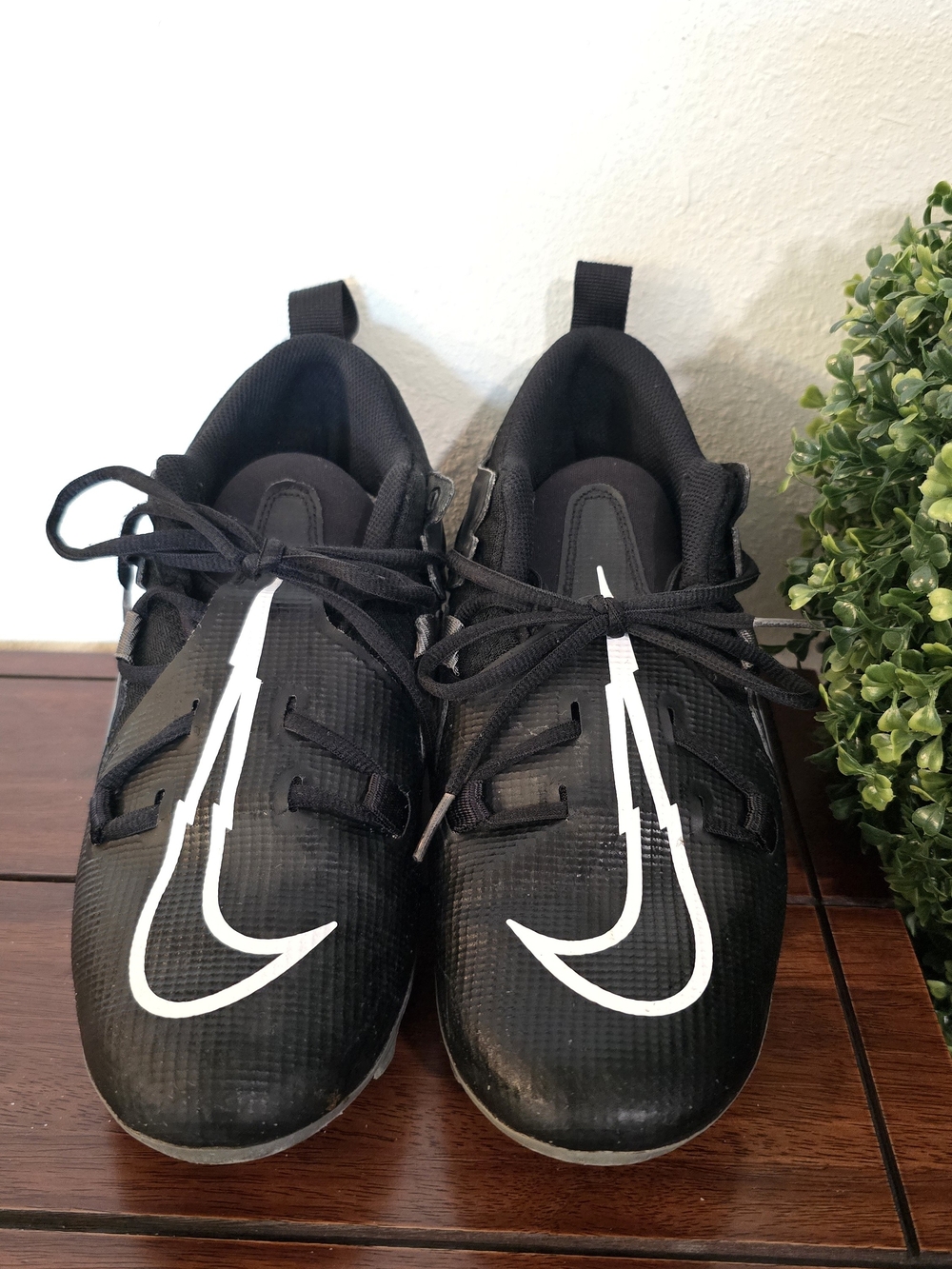 Nike Men’s Black Football Cleats with White Swoosh